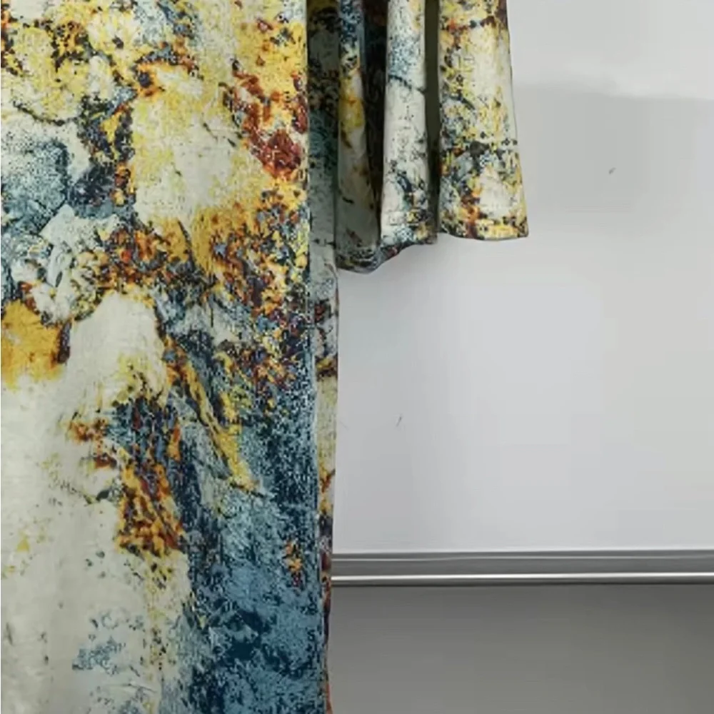 Marble print three quarter inch sleeve top